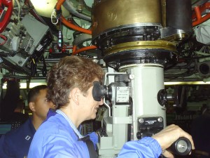 Image of Mary Jo looking in a periscope